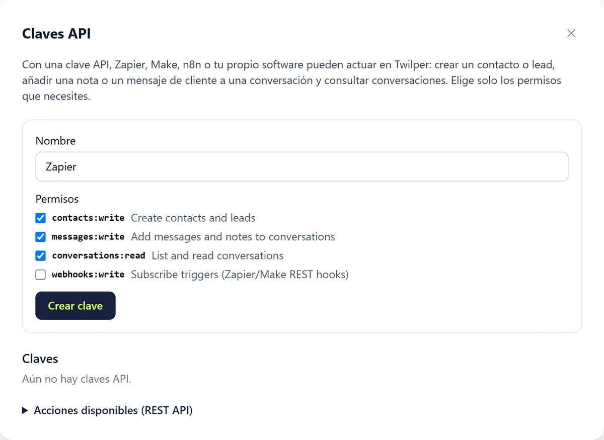 El asistente de Claves API con el campo Nombre, los permisos contacts:write, messages:write, conversations:read y webhooks:write y el botón Crear clave.