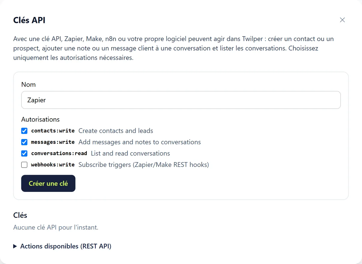 L'assistant Clés API avec le champ Nom, les autorisations contacts:write, messages:write, conversations:read et webhooks:write et le bouton Créer une clé.